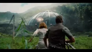 Man and woman walking to dome in forest — Jurassic World