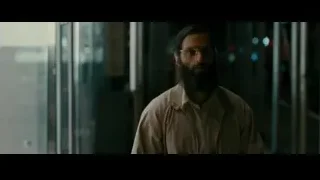 young man walking on a street at night — The Dictator