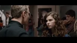 woman with curly hair and man — Steve Jobs