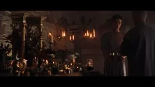 Man in robe holding wine in stone room — Gladiator