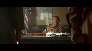 man in uniform at desk with flag — Hacksaw Ridge