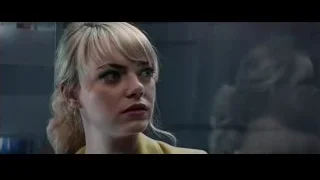 woman in yellow blazer with serious cityscape background — The Amazing Spider Man 2