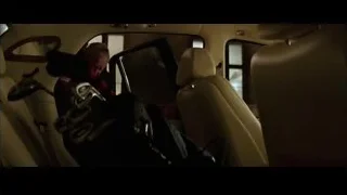 elderly man in car back seat — Batman