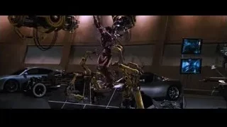 robot standing on platform in futuristic setting — Iron Man