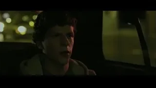 young man sitting in car looking out window — The Social Network