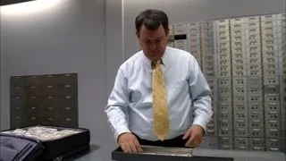 Man opening briefcase with money in locker room — Breaking Bad