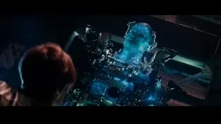 bald man in futuristic suit with blue machine — The Amazing Spider Man 2