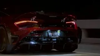 red sports car in dimly lit garage — Sports Cars