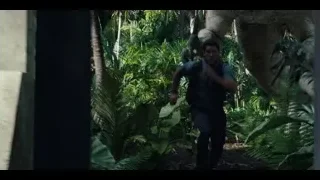 man walking with large animal — Jurassic World