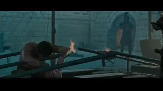Man kneeling in distress with blood dripping — Gladiator 2