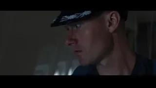 man looking out airplane window — Iron Man 3