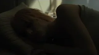 young woman sleeping on bed — Blade Runner 2049