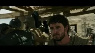 man in chainmail armor with soldiers — Gladiator 2