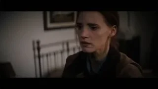 woman in dimly lit room with fireplace — Interstellar