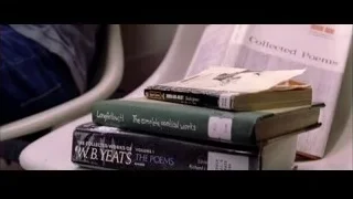 man looking at computer in laundromat — Spider Man 2