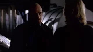 Bald man and blonde woman in futuristic room — Breaking Bad