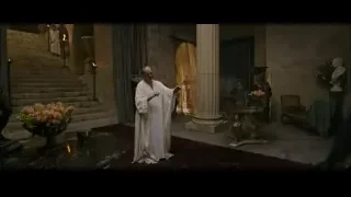 man in white robe in luxurious room — Gladiator 2