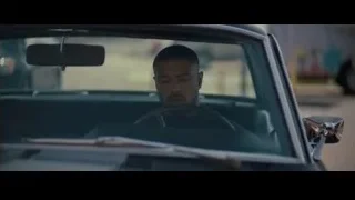 man in car looking out window — Creed 2