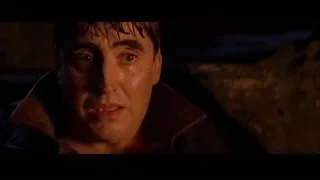 Man in leather jacket looking at camera — Spider Man 2