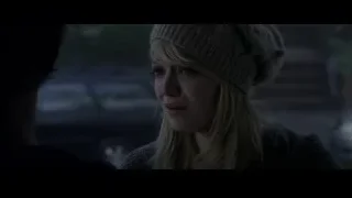 Blonde woman with beanie in dark room — The Amazing Spider Man