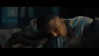 man lying on bed deep in thought — Creed 2