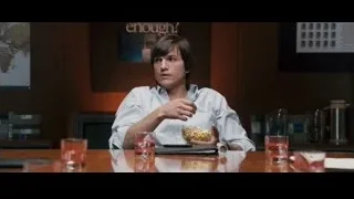 Young man deep in thought with popcorn — Jobs