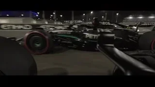 Formula One race car driving at night — F1
