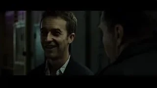 Two men conversing in dimly lit room — Fight Club
