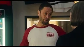 Man in "Original Beef" shirt in kitchen — The Bear