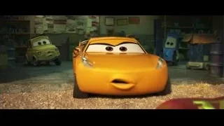 Lightning McQueen smiling in a garage — Cars 3