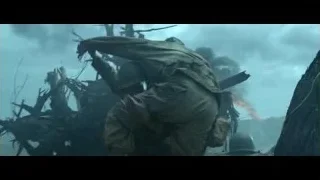 Soldier carrying injured soldier in battle — Hacksaw Ridge