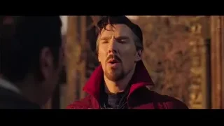 Man in red coat serious expression — Doctor Strange 2