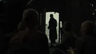 man with gun in train car doorway — Blade Runner 2049