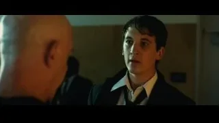 men in suits speaking in dim room — Whiplash