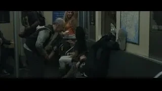 People on subway train, man lying on floor — The Amazing Spider Man