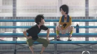 two young boys sitting in stadium — Weathering with You