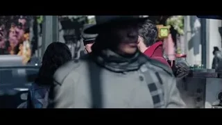People on busy street with man in cap — Doctor Strange 2
