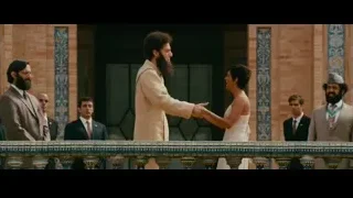 two men embracing on balcony — The Dictator