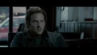 man sitting in dimly lit room with window — Limitless