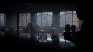 people in dimly lit restaurant with stained glass windows — Peaky Blinders