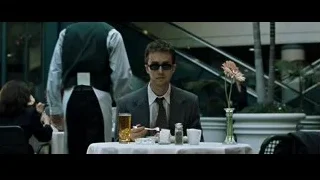 Man in suit and glasses looking serious — Fight Club