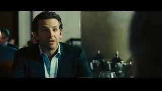 man sitting at table in restaurant — Limitless