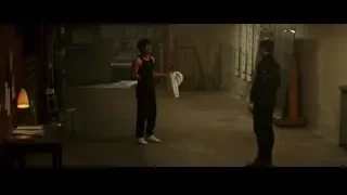 Two men standing in dimly lit concrete room — Bruce Lee: Birth of The Dragon