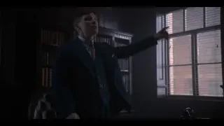 Man in suit deep in thought in dark room — Peaky Blinders