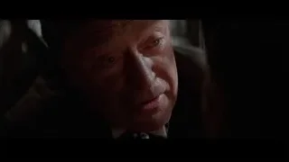 older man's face serious expression — Batman