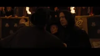 people with torches in dimly lit room — Harry Potter and the Goblet of Fire