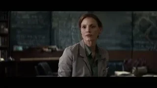 Woman in library with chalkboard — Interstellar