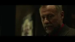 man with grey hair and beard in suit — John Wick