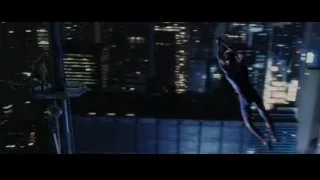 Miles Morales flying over night cityscape — The Amazing Spider Man
