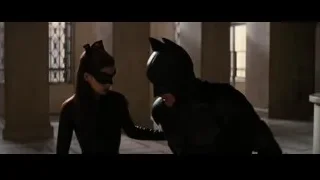 Batman standing with Catwoman in hallway — Batman: The Dark Knight Rises